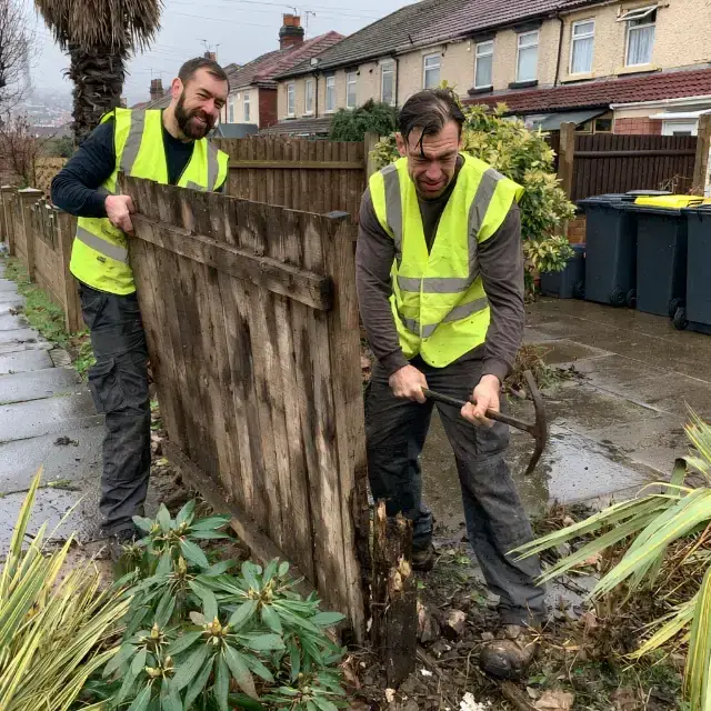 Fence Removal in Glasgow — clearing and carrying items out to the van