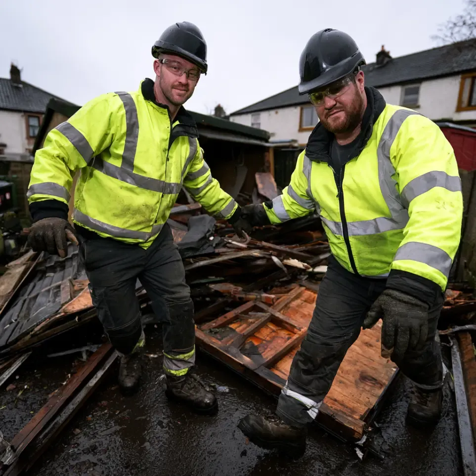 Garage Shed Demolition in Glasgow — clearing and carrying items out to the van